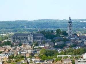 The Saint Waltrude collegiate church and belfry of Mons, Belgium. La collégiale Sainte Waudru et le beffroi de Mons, Belgique.